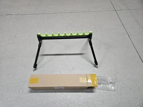 Portable fishing rod stand folded flat for transport